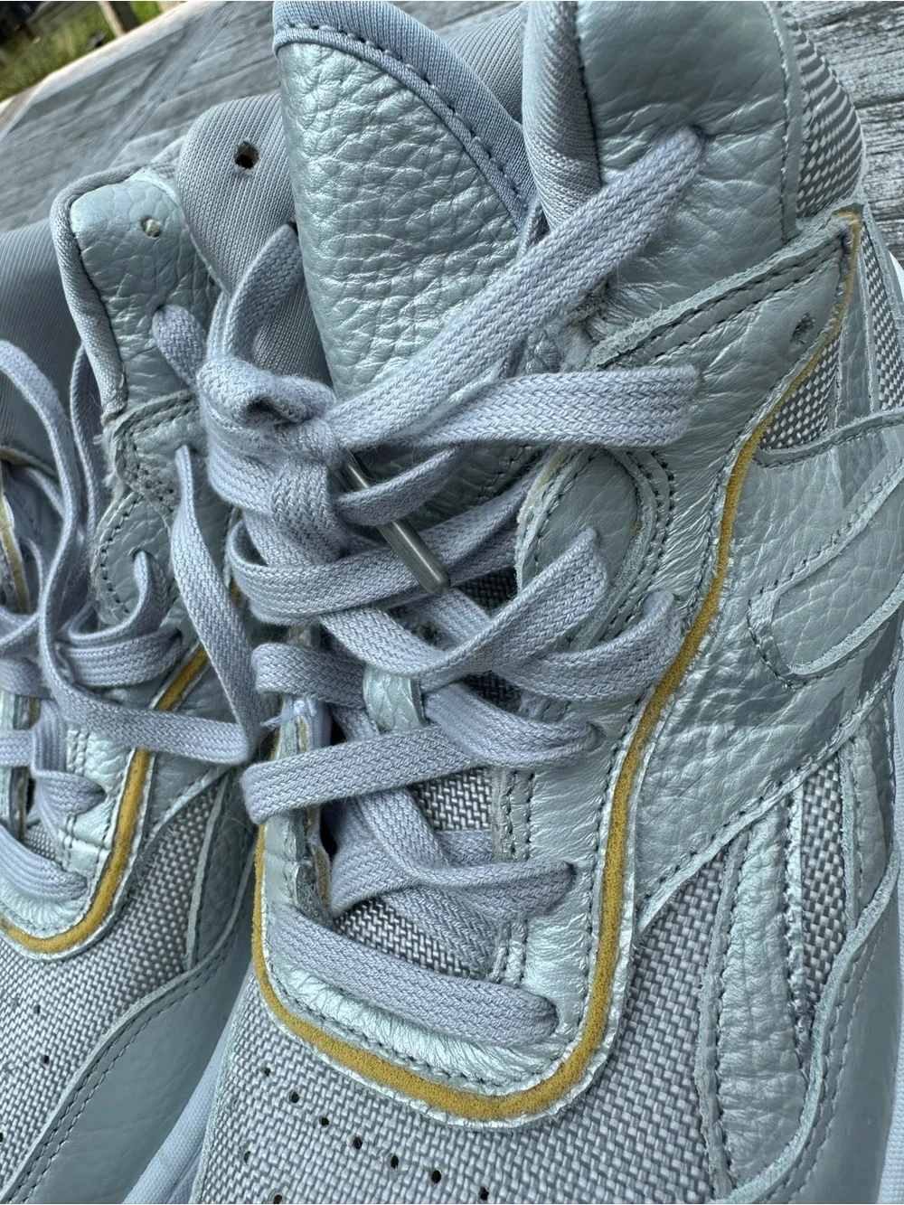Reebok Silver Metallic High-Top Sneakers with Gold Accent